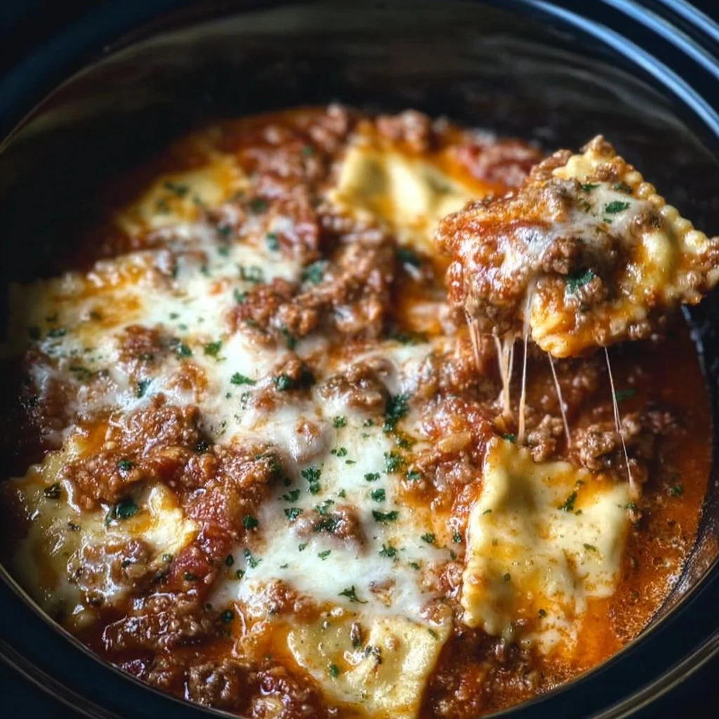 Crockpot Ravioli Lasagna dish showcasing layers of pasta and cheese in a slow cooker