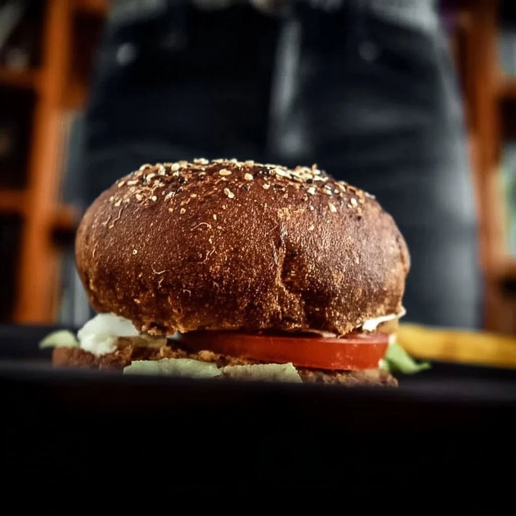 A delicious homemade bean burger served with fresh toppings