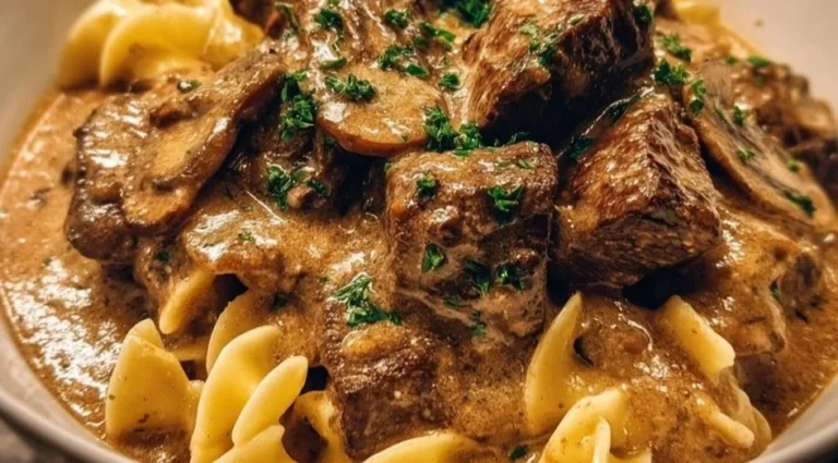Gordon Ramsay's delicious Beef Stroganoff served with pasta and garnished with parsley