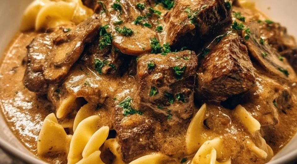 Gordon Ramsay's delicious Beef Stroganoff served with pasta and garnished with parsley